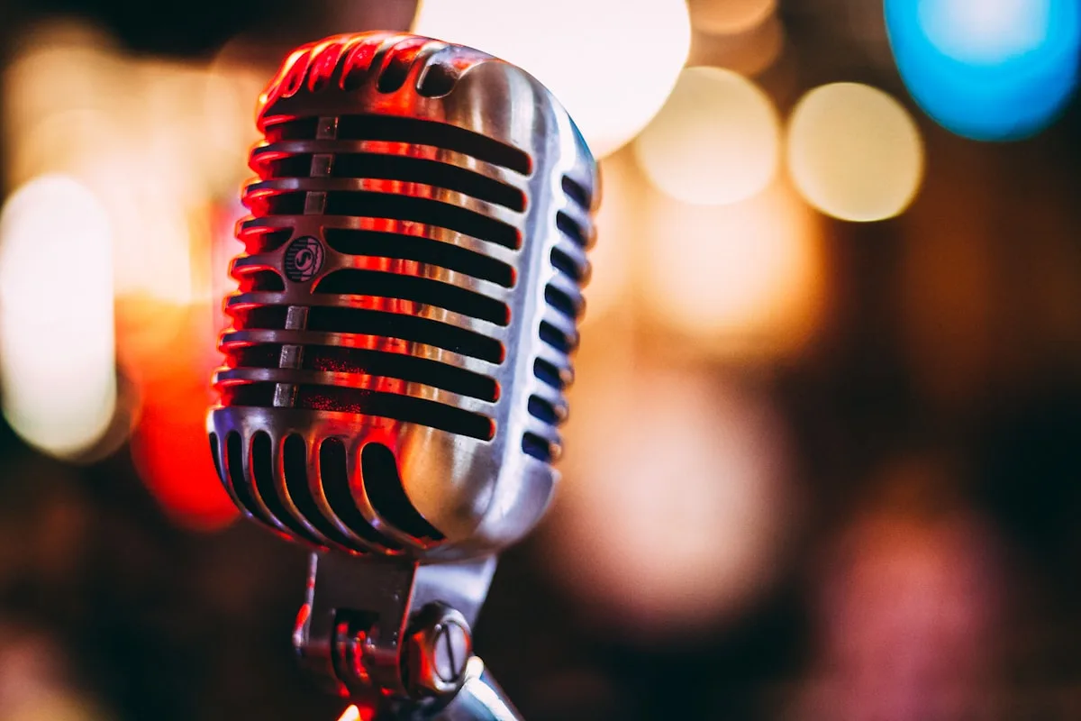 Microphone in studio setting—generic visual for hip-hop artist relationship and collaboration context