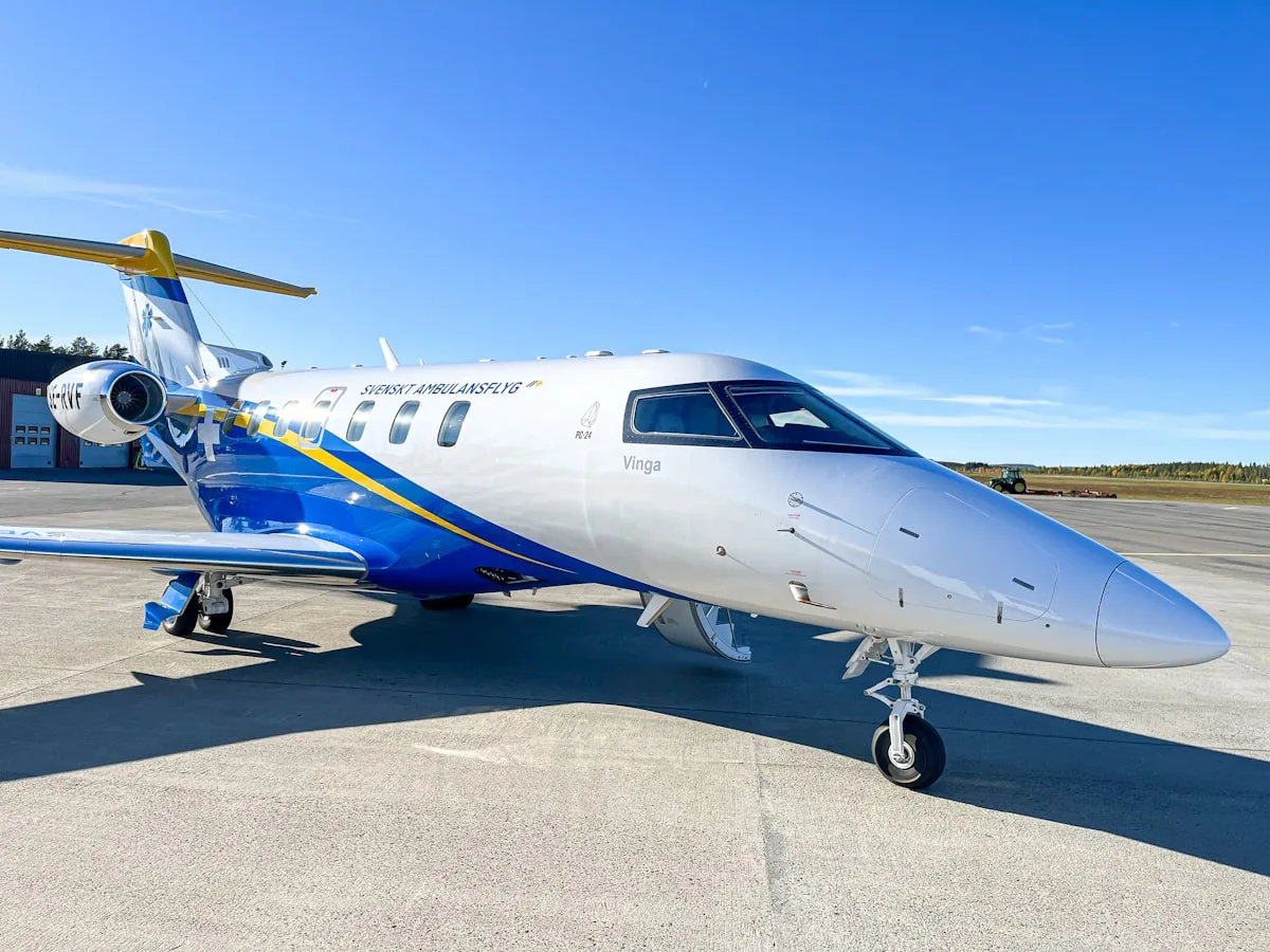A small white and blue medical-style aircraft parked on a runway—illustrative imagery for the sanitary charter flight that repatriated five French passengers from the hantavirus-hit MV Hondius to Le Bourget airport on May 10, 2026