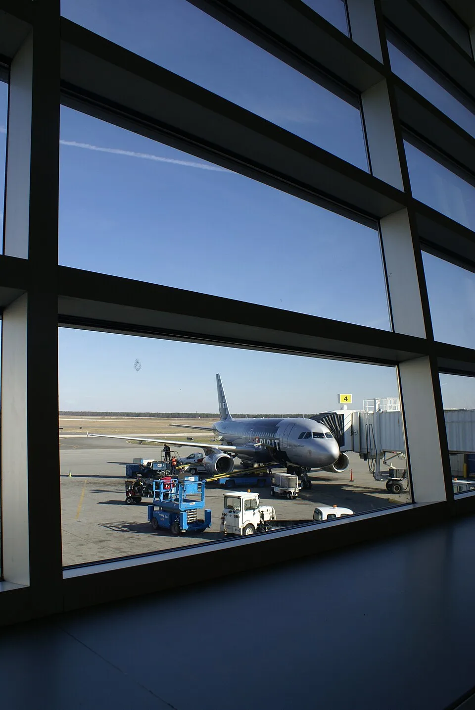 Spirit Airlines aircraft at an airport gate—editorial context for coverage tied to the airline’s bankruptcy news cycle