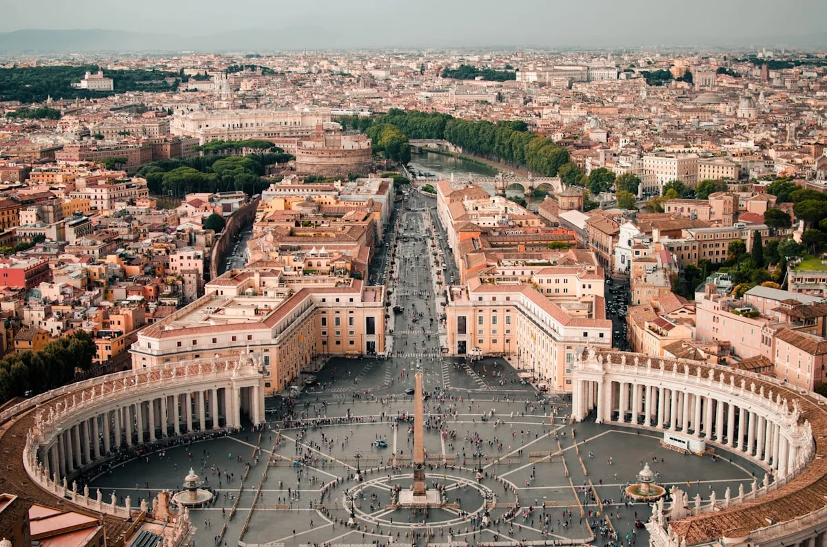 Rome cityscape with St Peter's Basilica dome at sunset, illustrative backdrop for the Italy-US-Vatican triangle over the Iran war and Pope Leo XIV