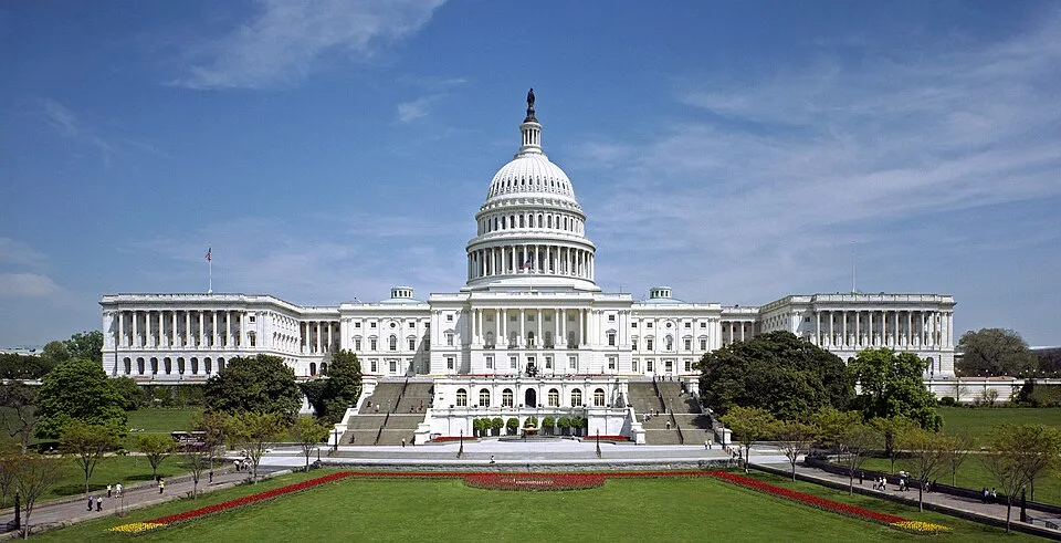 West front of the United States Capitol in Washington, D.C. (Wikimedia Commons) — illustrative imagery for Newsorga's analysis of how Elon Musk continues to influence US politics and federal policy after leaving his formal Department of Government Efficiency role in the Trump administration in May 2025, including through America PAC political spending, Tesla and SpaceX regulatory exposure, and the X social platform.