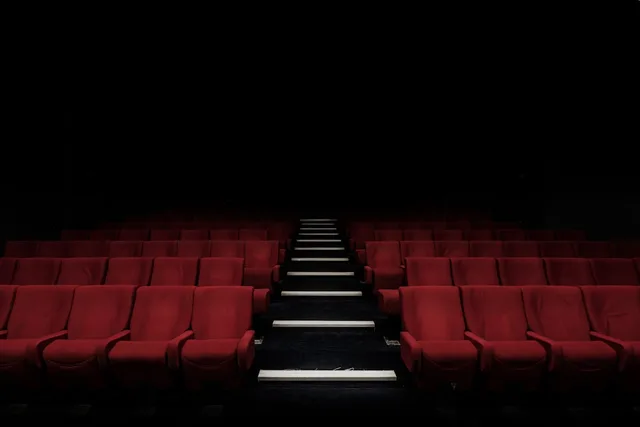 Darkened cinema auditorium with rows of seats—editorial context for a theatrical wide release; not Paris Jackson, RZA, or production stills