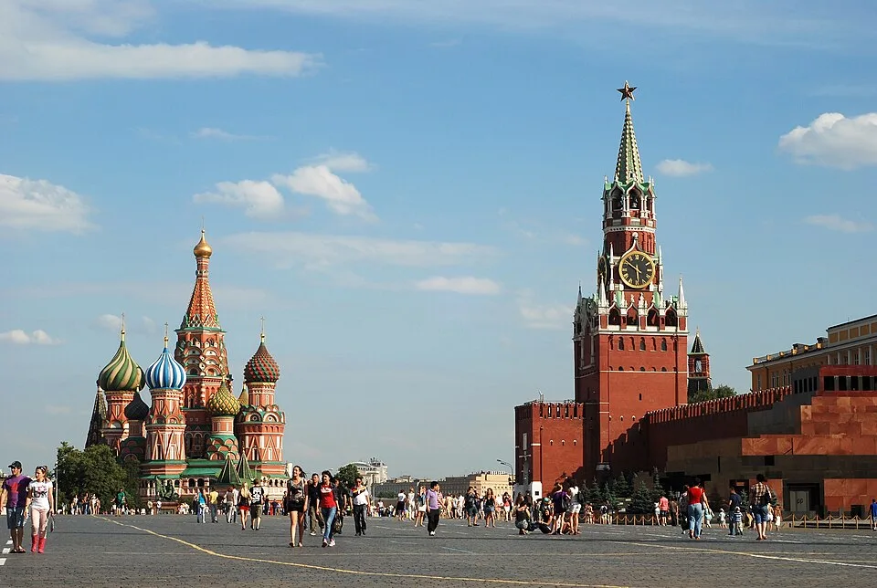 Red Square in Moscow with St Basil’s Cathedral and the Kremlin’s Spasskaya Tower—symbols of the Russian capital, not a specific 2026 event