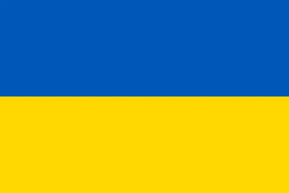 National flag of Ukraine (blue over yellow; Wikimedia Commons) — illustrative imagery for Newsorga's day-two sitrep on the U.S.-brokered May 9-11, 2026 Victory Day ceasefire between Russia and Ukraine, in which President Volodymyr Zelenskyy says large-scale Russian air attacks on Ukrainian cities have paused but front-line combat continues with 147 clashes and three civilian deaths in 24 hours, while Russia's Defence Ministry separately claims to have recorded more than 1,000 Ukrainian ceasefire violations across Crimea, Belgorod, Kursk, Kaluga, Rostov and Krasnodar.