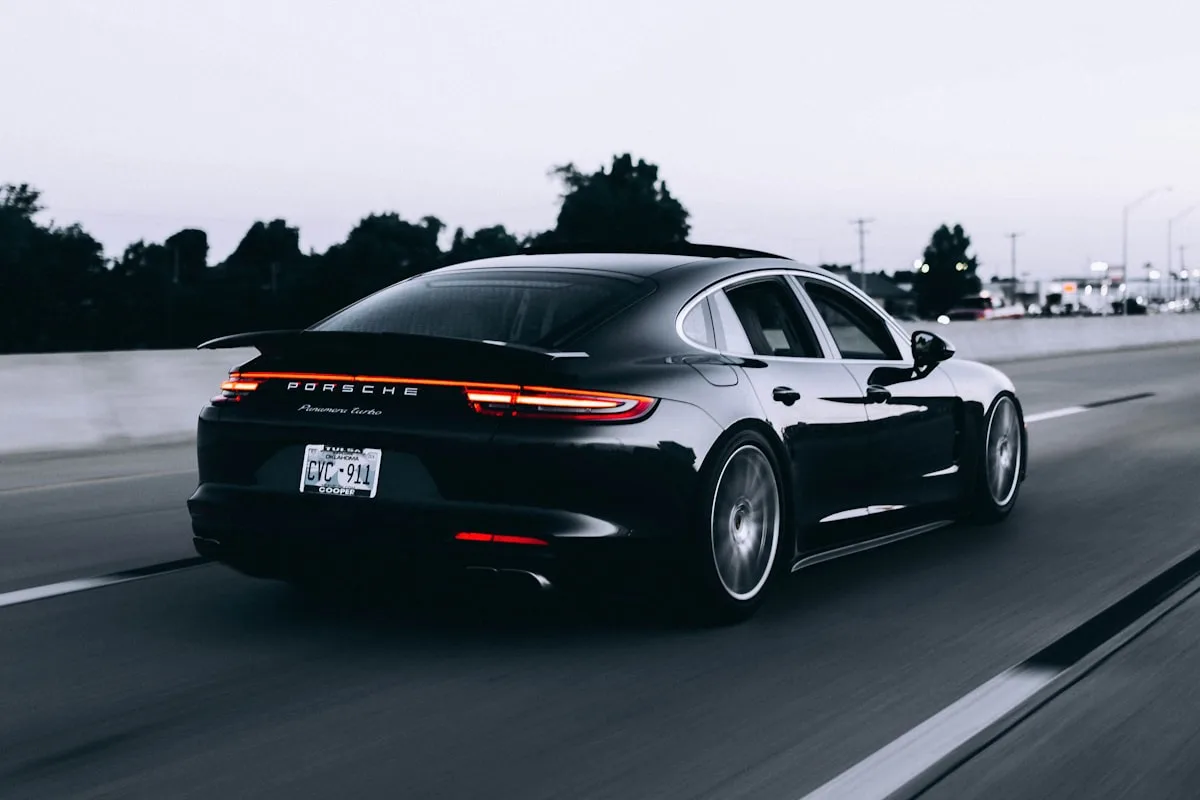 Row of modern passenger cars—illustrative imagery for Newsorga’s tracker of upcoming U.S. vehicle launches in 2026–2027.